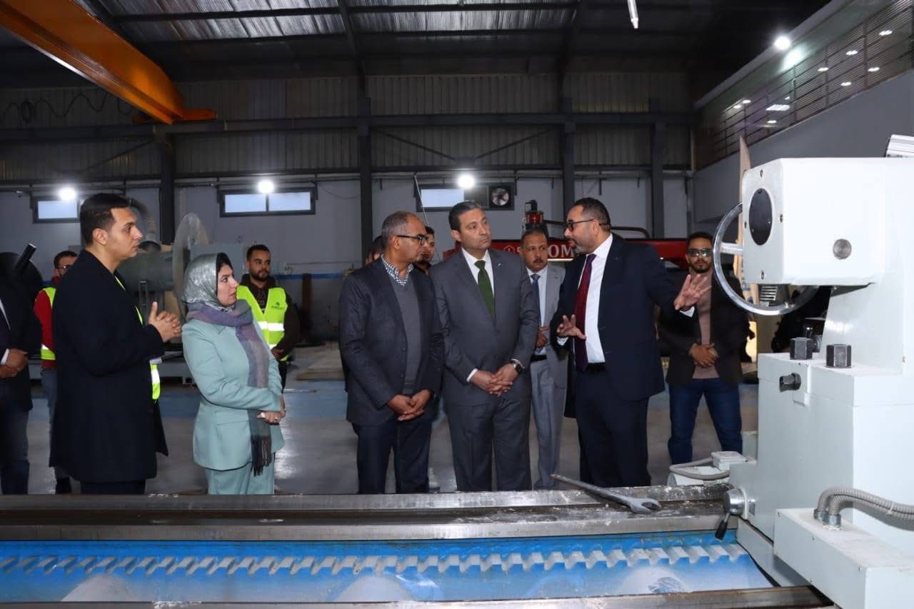 The visiting delegation inspecting a PureLife production machine